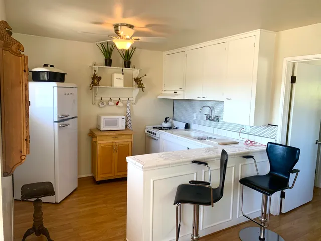 a view of living room with washer and dryer