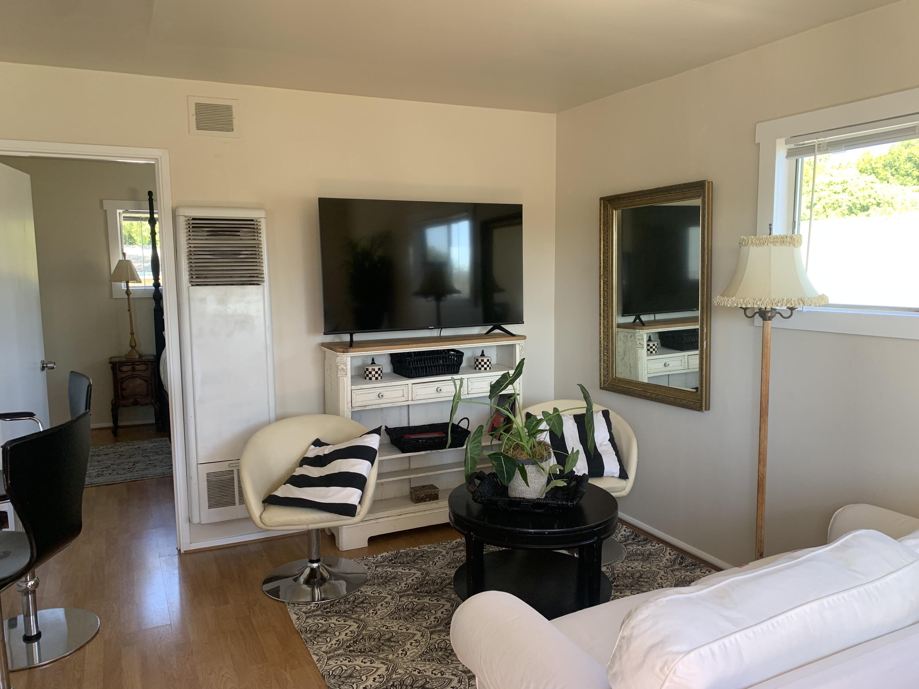 2528 De La Vina Street Santa Barbara, CA 93105 - Photo 3 of 32 a living room with furniture and a flat screen tv