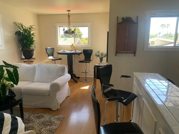 a living room with furniture and a window