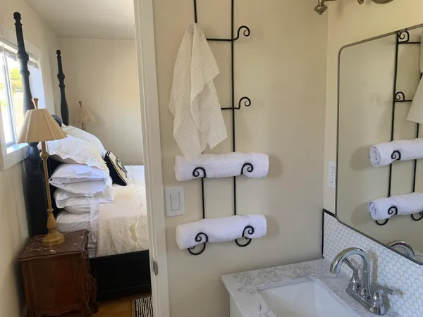 a bathroom with a sink and mirror