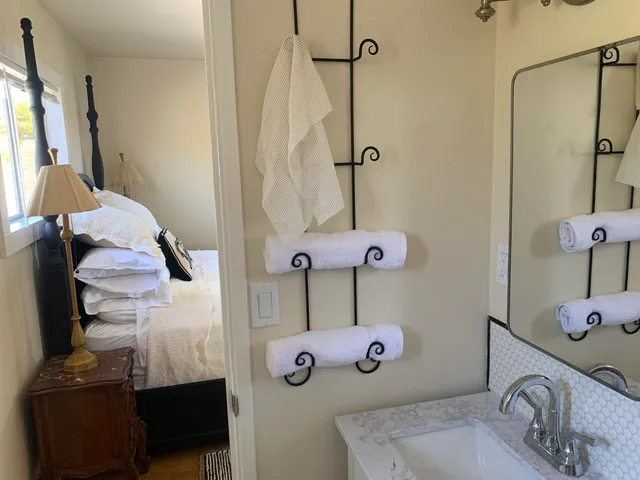 a bathroom with a sink and mirror