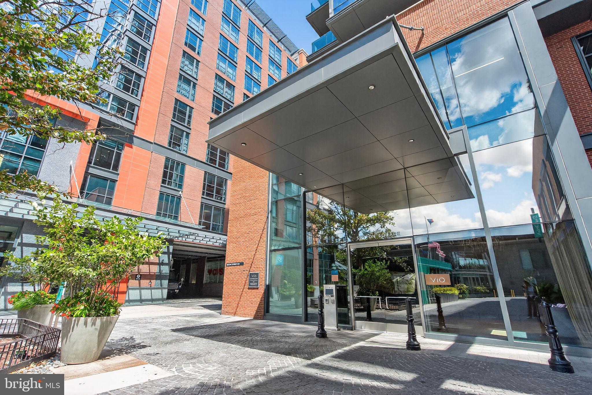 45 Sutton Square Southwest, Unit 509 Washington, DC 20024 - Photo 18 of 25 a view of a building with a porch