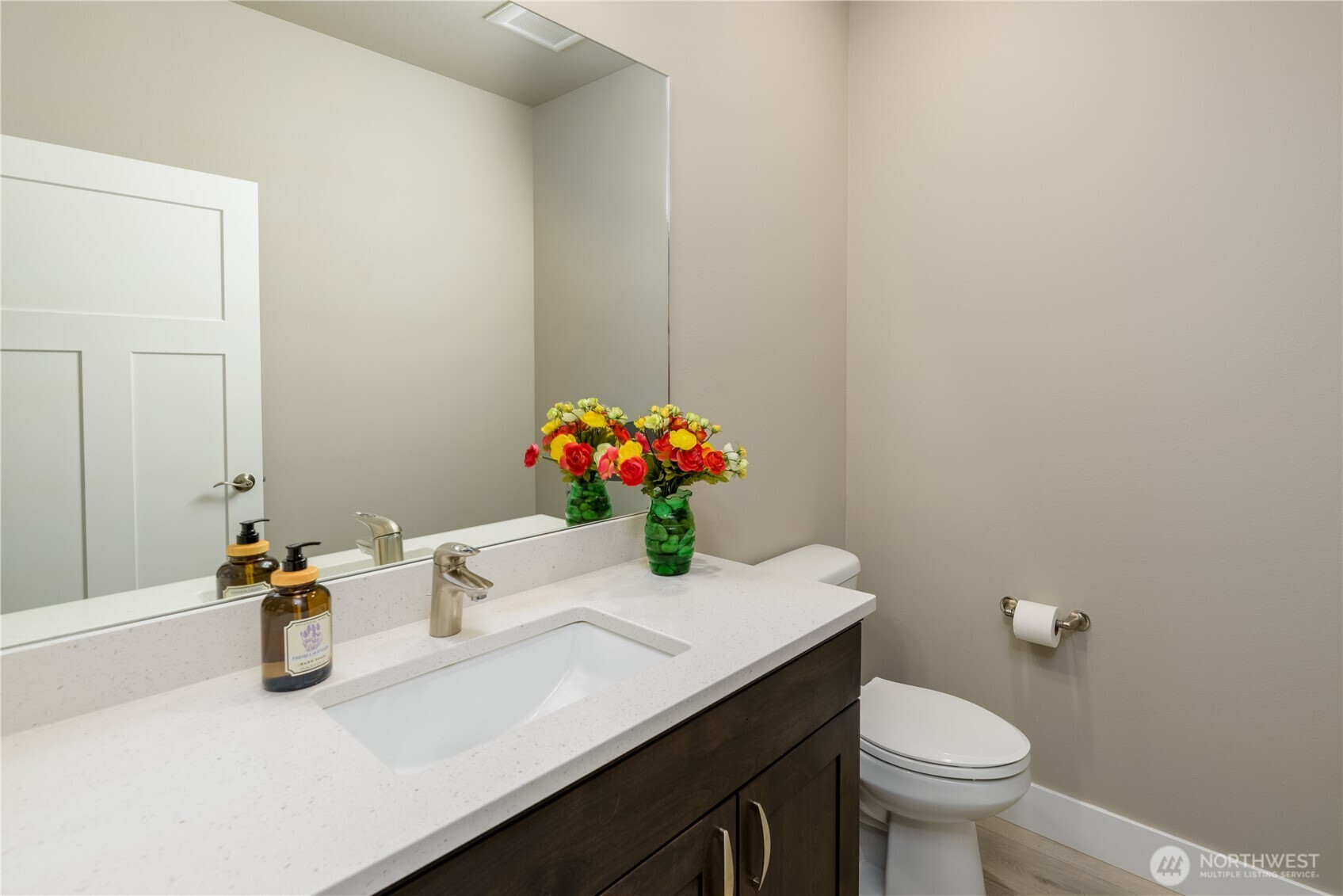 621 Jones Farm Road Sequim, WA 98382 - Photo 33 of 40 a bathroom with a sink a toilet and mirror