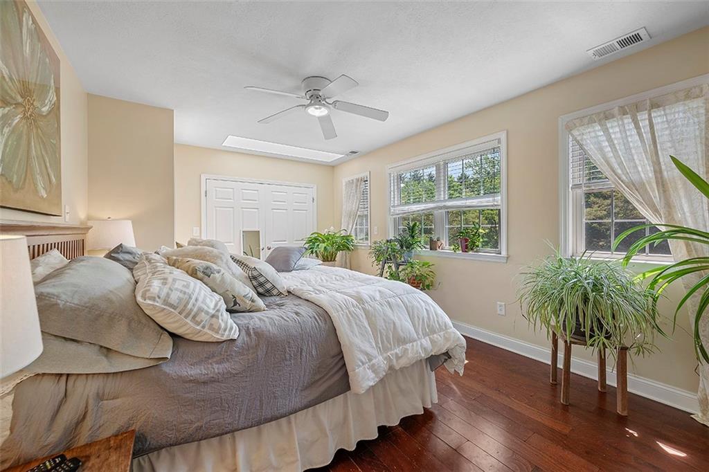 39 Diebold Road McKees Rocks, PA 15136 - Photo 13 of 25 a bedroom with a bed window and wooden floor
