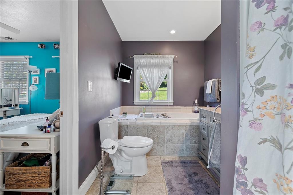 39 Diebold Road McKees Rocks, PA 15136 - Photo 17 of 25 a bathroom with a sink toilet and shower