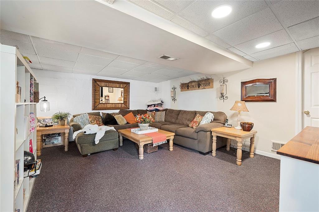 39 Diebold Road McKees Rocks, PA 15136 - Photo 20 of 25 a living room with lots of furniture and a window