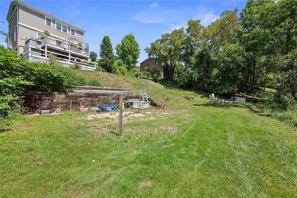39 Diebold Road McKees Rocks, PA 15136 - Photo 25 of 25 a view of a swimming pool with a yard