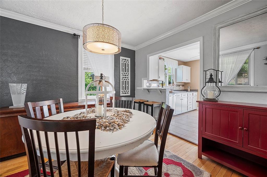 39 Diebold Road McKees Rocks, PA 15136 - Photo 4 of 25 a view of a dining room with furniture window and wooden floor