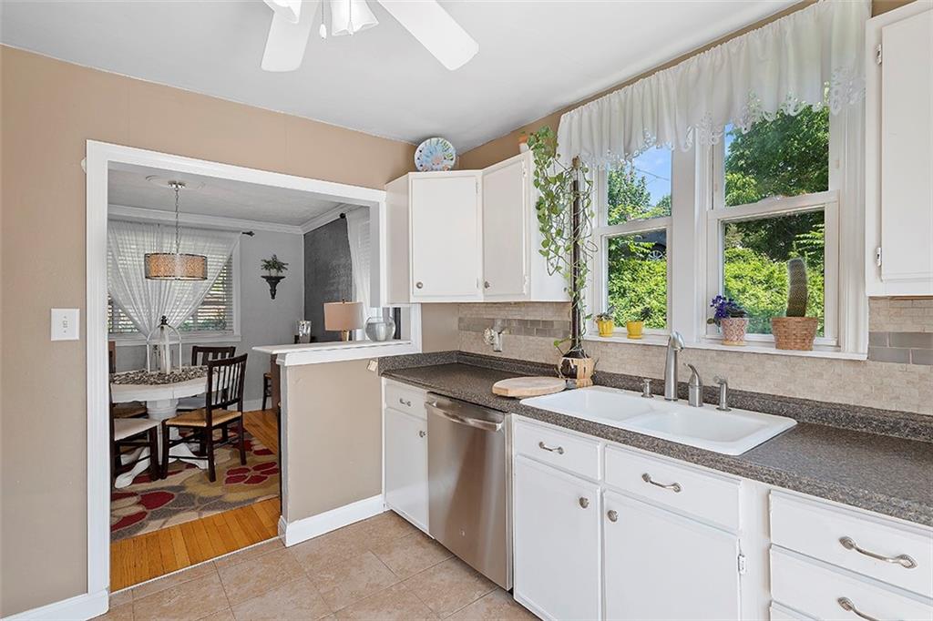 39 Diebold Road McKees Rocks, PA 15136 - Photo 6 of 25 a kitchen with a sink cabinets and window