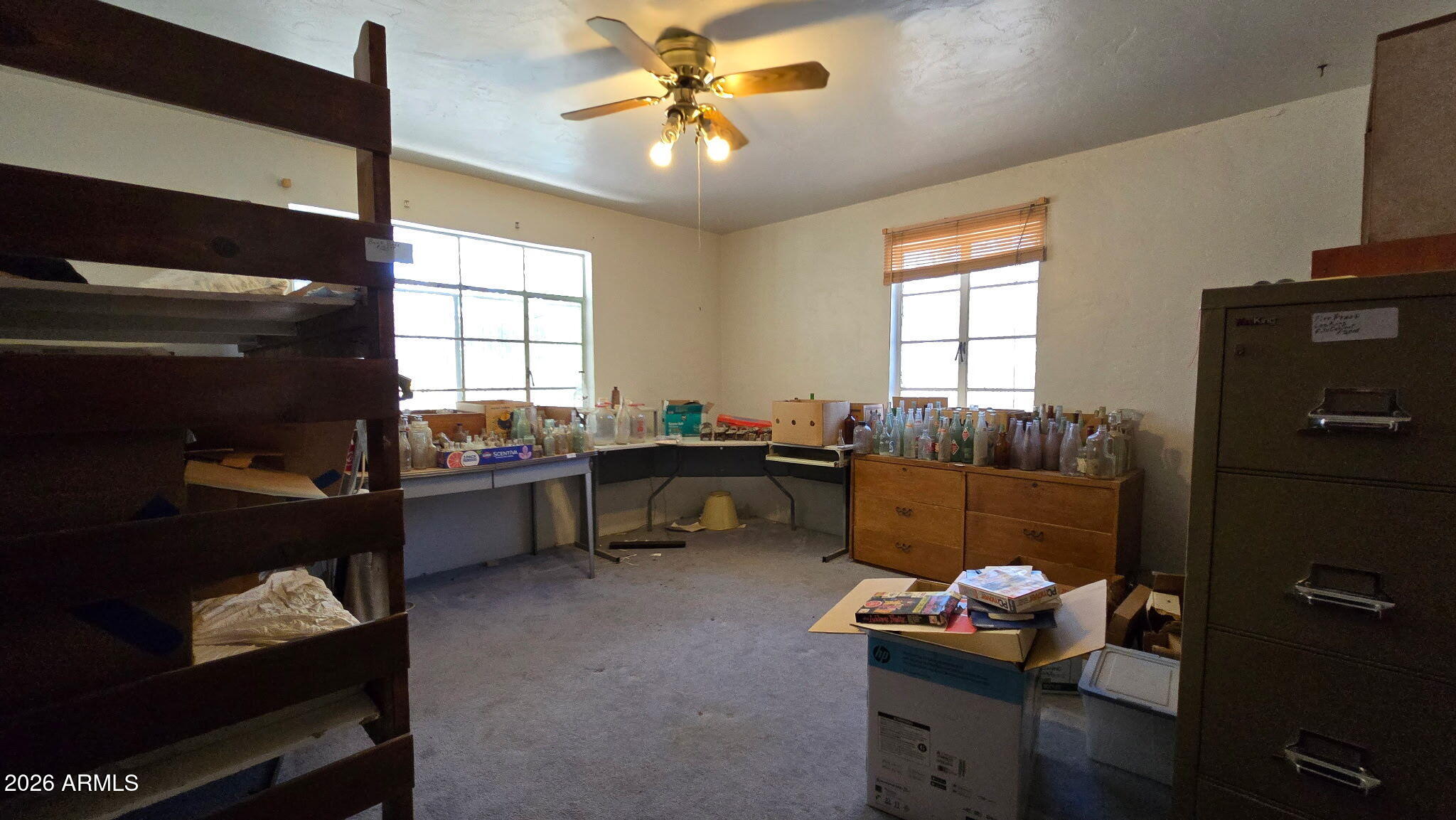 6803 South Miller Road Buckeye, AZ 85326 - Photo 15 of 50 a living room with furniture and a window