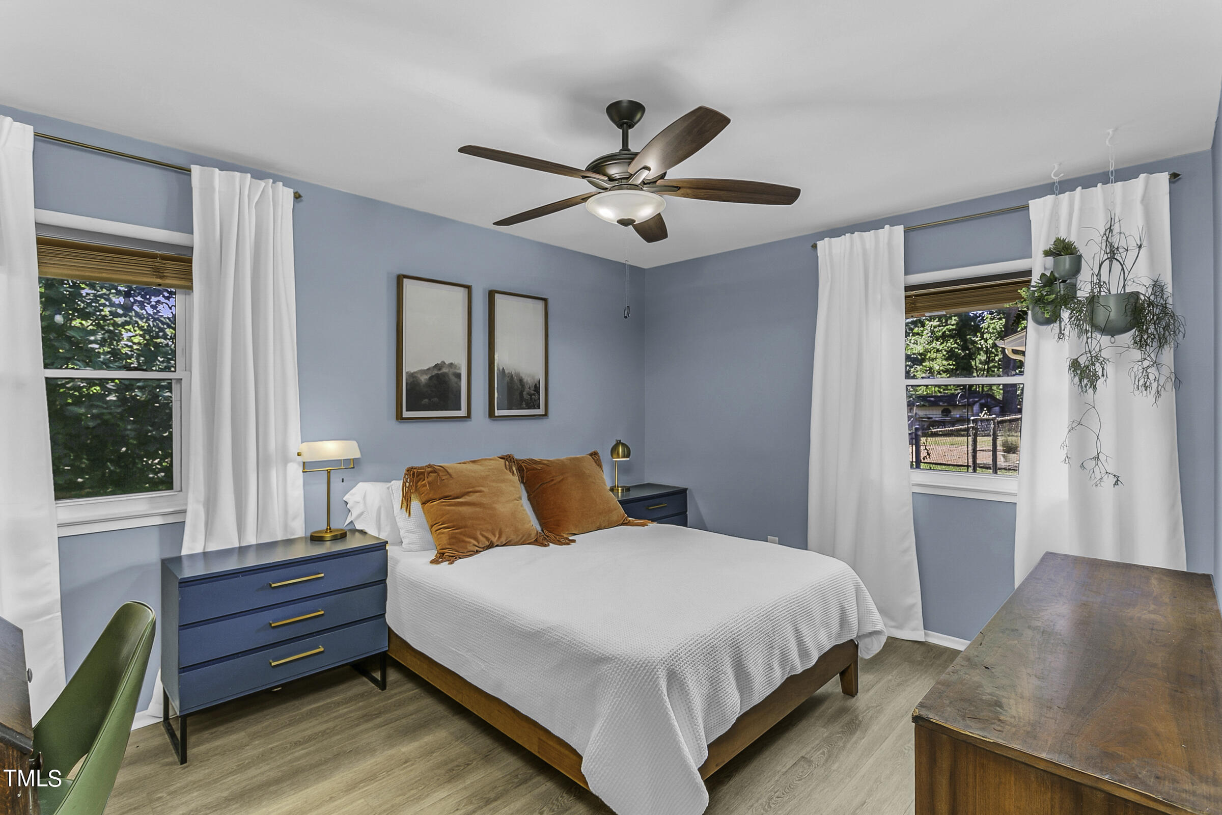 4120 Toroella Street Durham, NC 27704 - Photo 13 of 21 a bedroom with a bed and a window