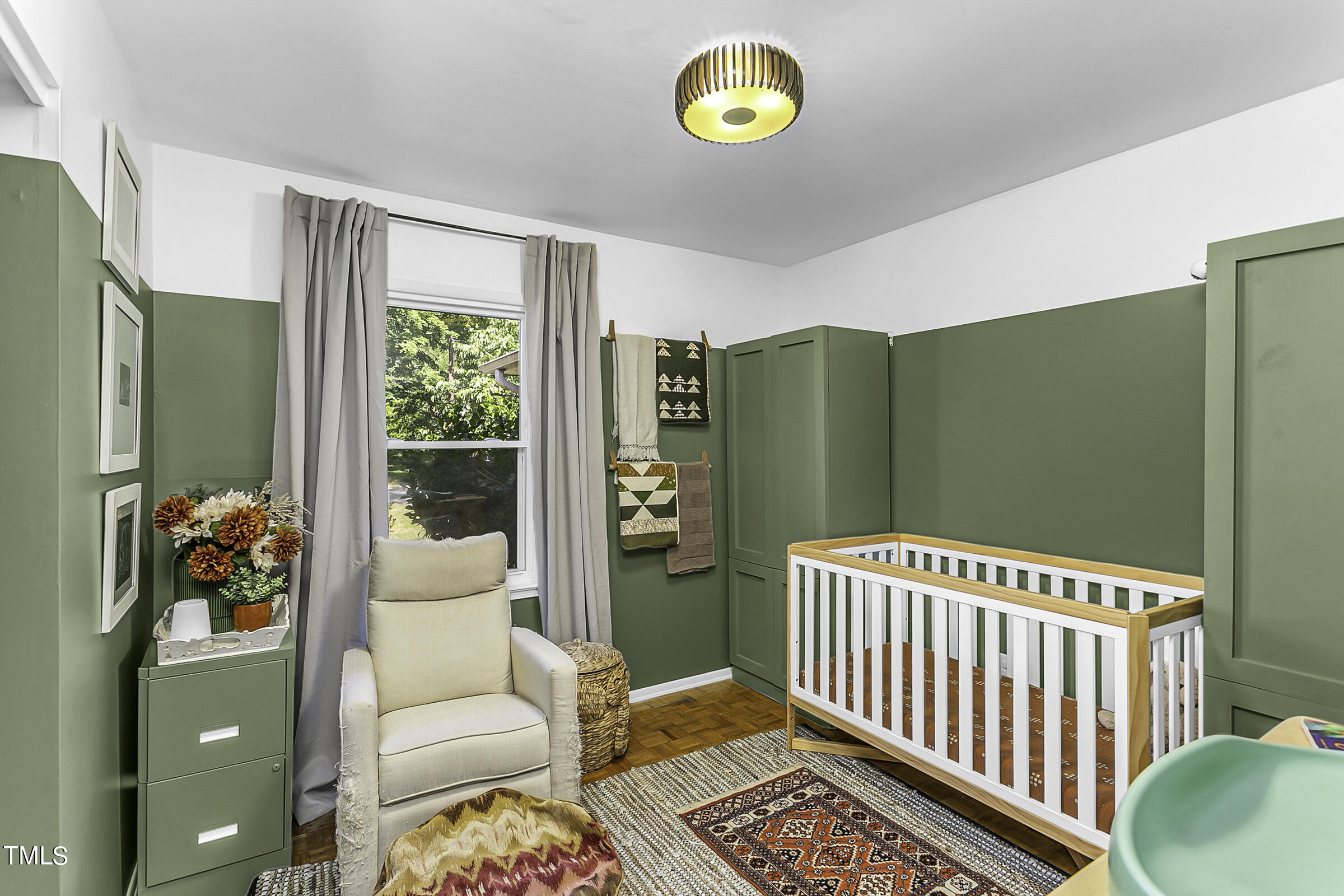 4120 Toroella Street Durham, NC 27704 - Photo 18 of 21 a bedroom with a bed and a window