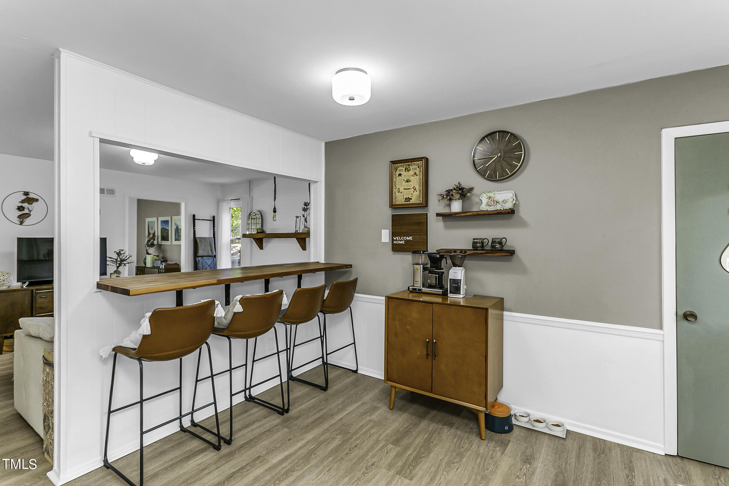 4120 Toroella Street Durham, NC 27704 - Photo 10 of 21 a dining room with furniture and wooden floor