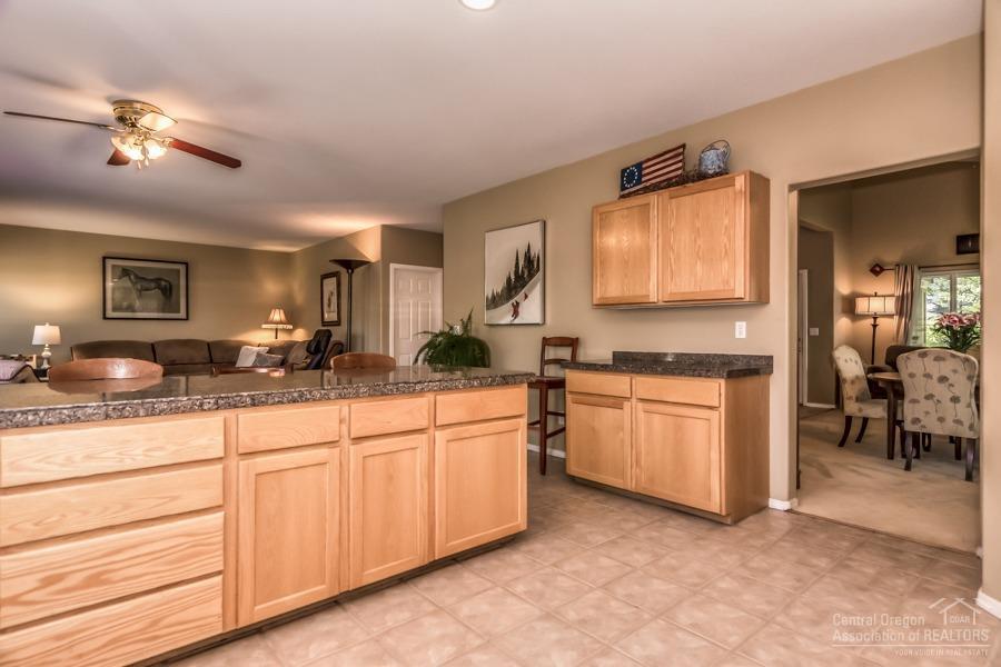 Kitchen looking into great room (left) a