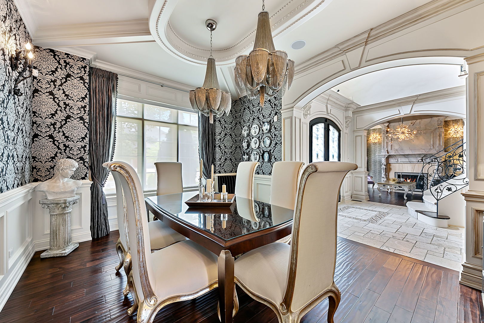8611 Crest Court Burr Ridge, IL 60527 - Photo 17 of 58 a dining room with furniture a chandelier and wooden floor
