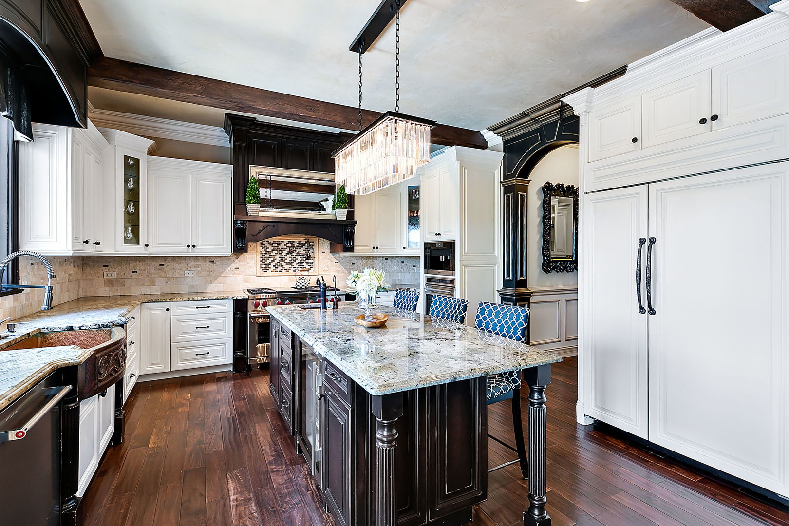 8611 Crest Court Burr Ridge, IL 60527 - Photo 21 of 58 a kitchen with white cabinets and stainless steel appliances