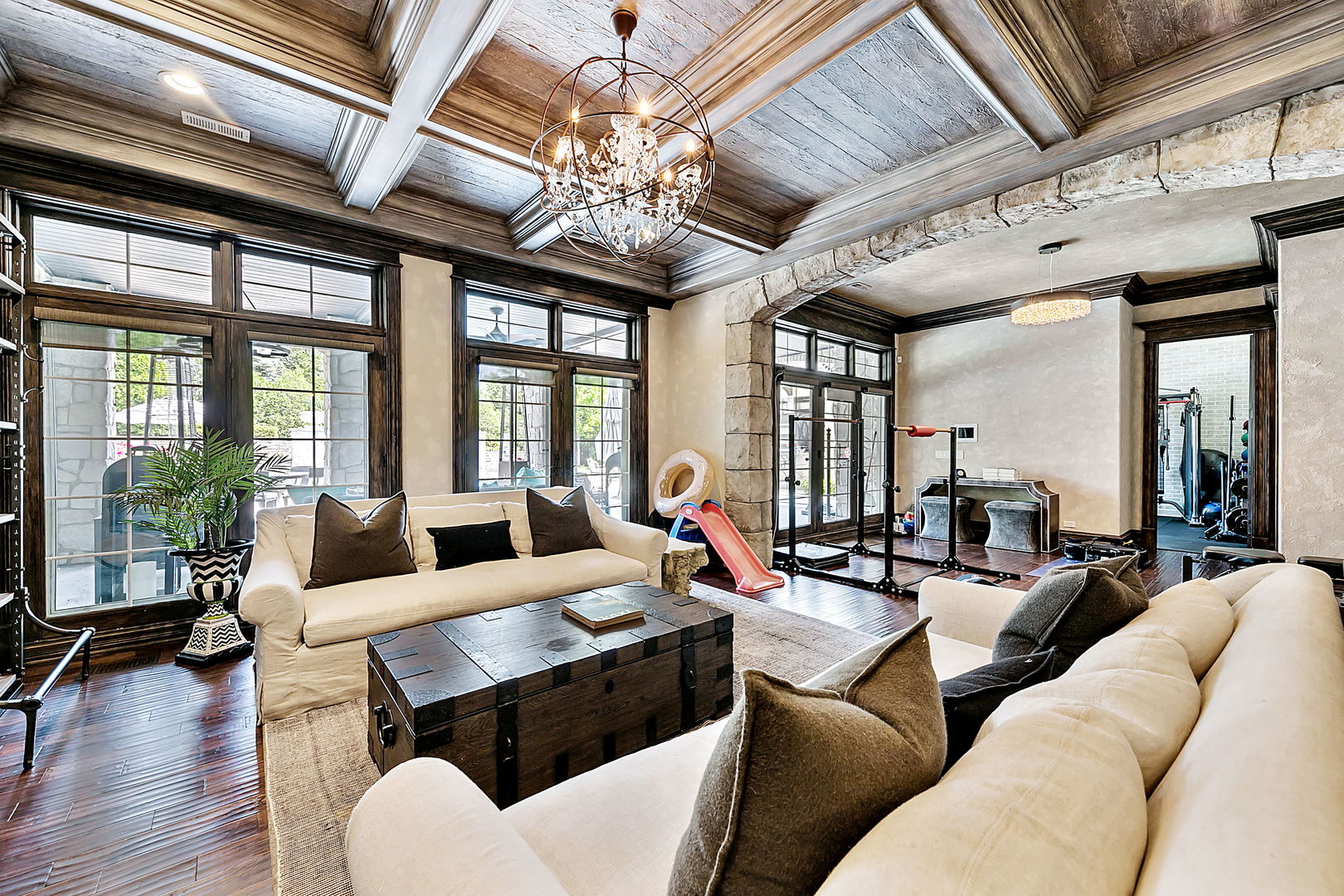 8611 Crest Court Burr Ridge, IL 60527 - Photo 24 of 58 a living room with furniture or chandelier and a wooden floor