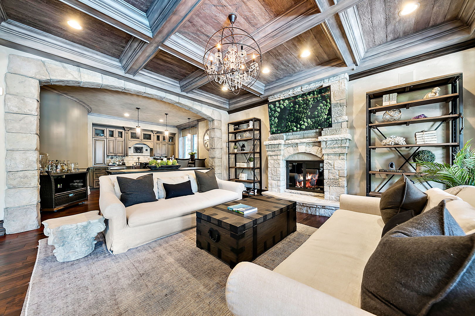 8611 Crest Court Burr Ridge, IL 60527 - Photo 26 of 58 a living room with furniture a chandelier and a fireplace