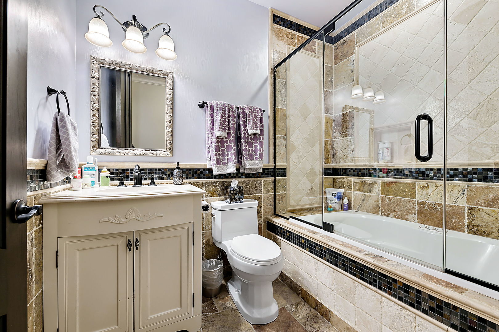 8611 Crest Court Burr Ridge, IL 60527 - Photo 39 of 58 a bathroom with a double vanity sink mirror and toilet