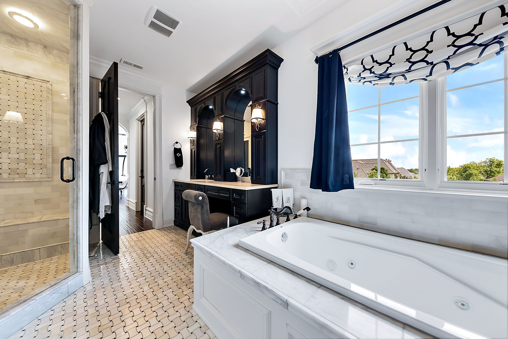 8611 Crest Court Burr Ridge, IL 60527 - Photo 44 of 58 a en suite bathroom with a granite countertop tub and a large mirror