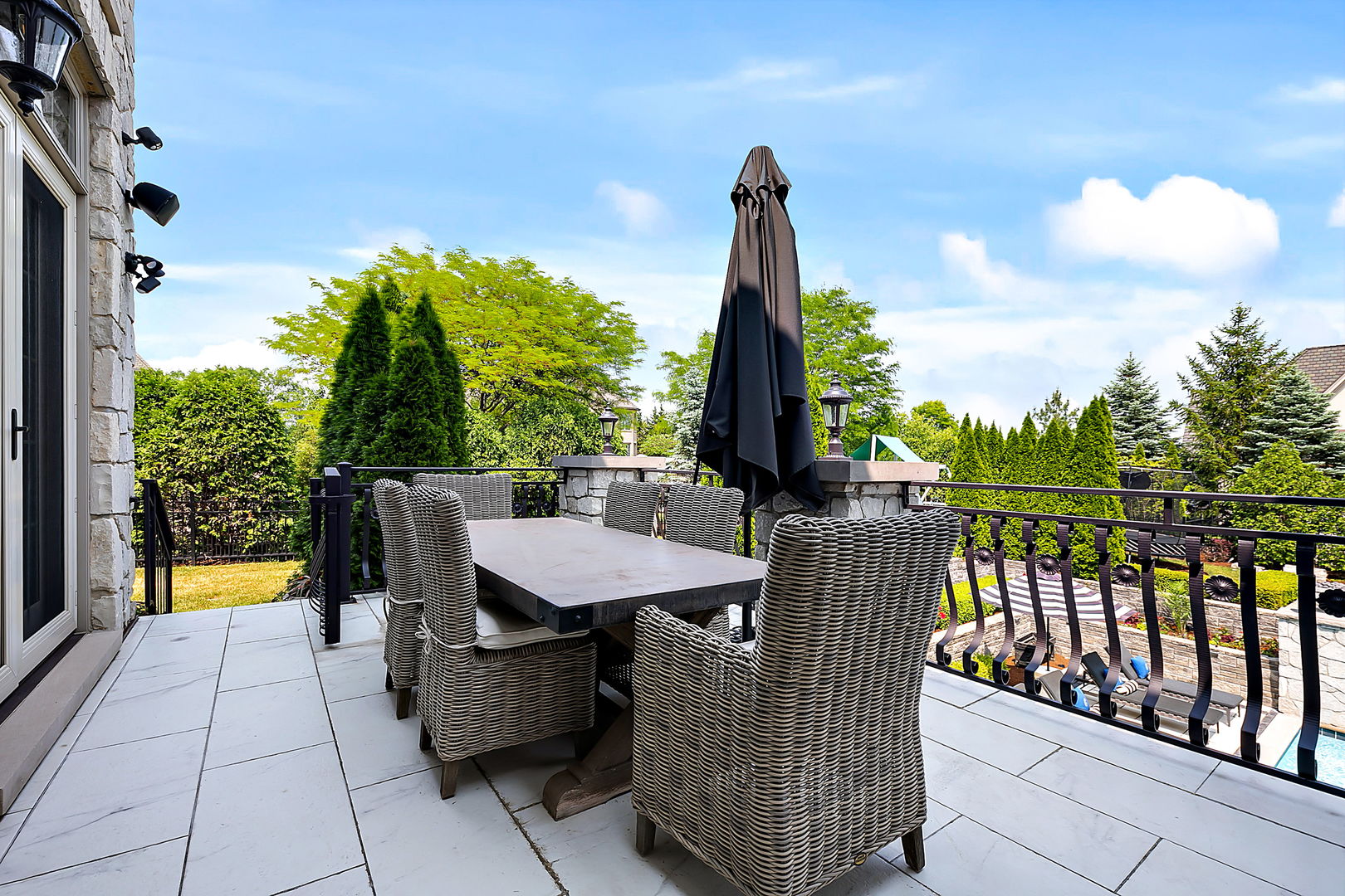 8611 Crest Court Burr Ridge, IL 60527 - Photo 53 of 58 a view of a patio with a table chairs and a swimming pool