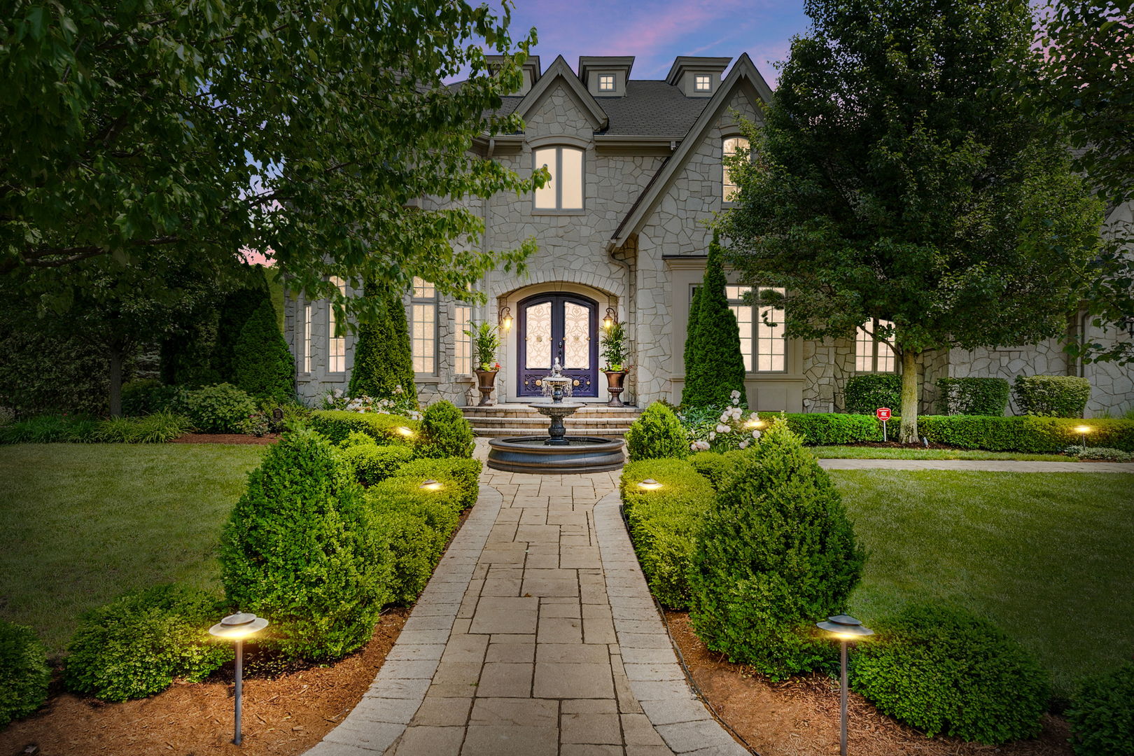 8611 Crest Court Burr Ridge, IL 60527 - Photo 57 of 58 a front view of a house with a yard