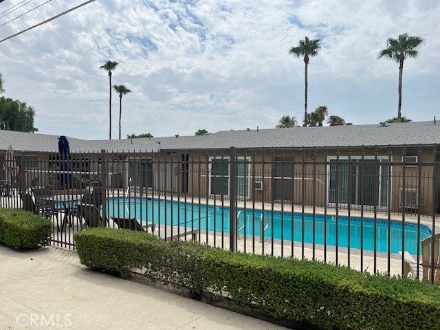 686 East Cottonwood Road, Unit 6 Palm Springs, CA 92262 - Photo 11 of 12 a view of a garden with a slide