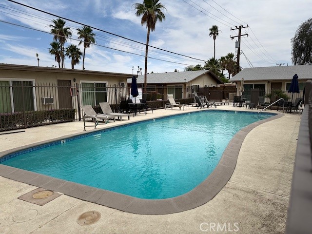 686 East Cottonwood Road, Unit 6 Palm Springs, CA 92262 - Photo 10 of 12 a view of a house with sitting area