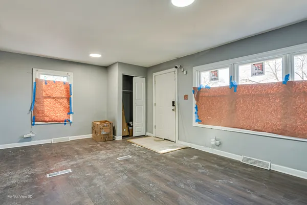 an empty room with windows