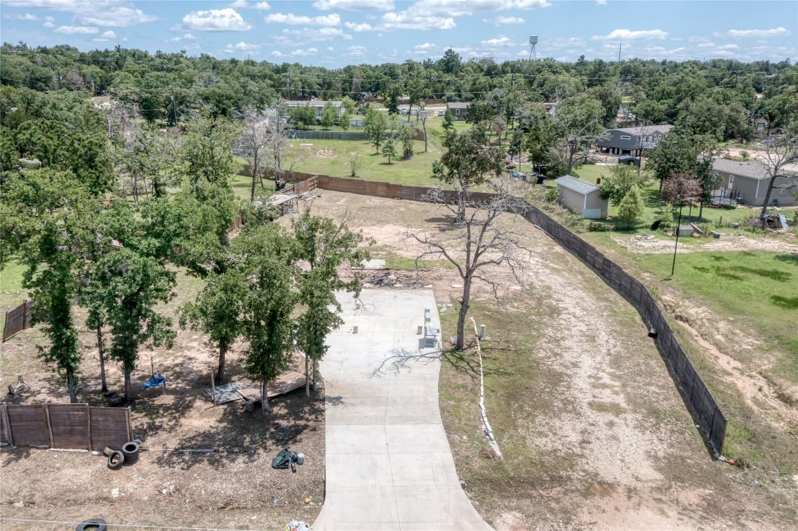 133 Wisteria Way Elgin, TX 78621 - Photo 5 of 18 a view of a lake with a yard