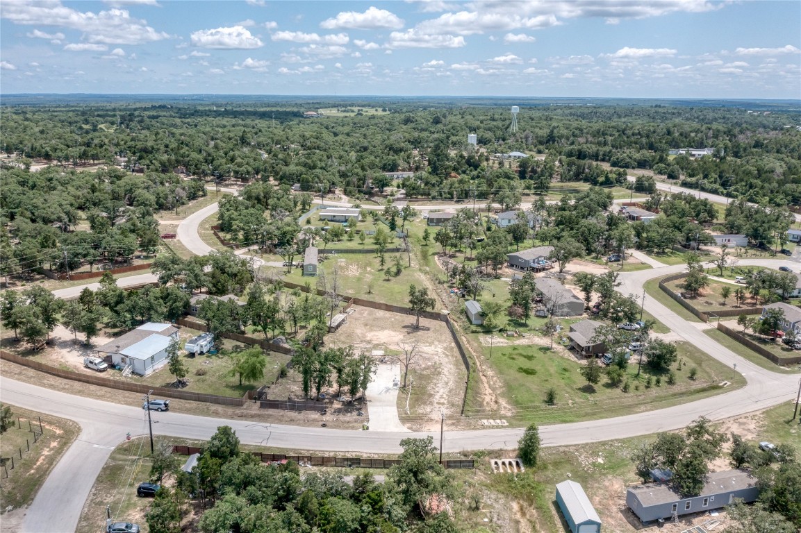 133 Wisteria Way Elgin, TX 78621 - Photo 9 of 18 an aerial view of a houses with a yard
