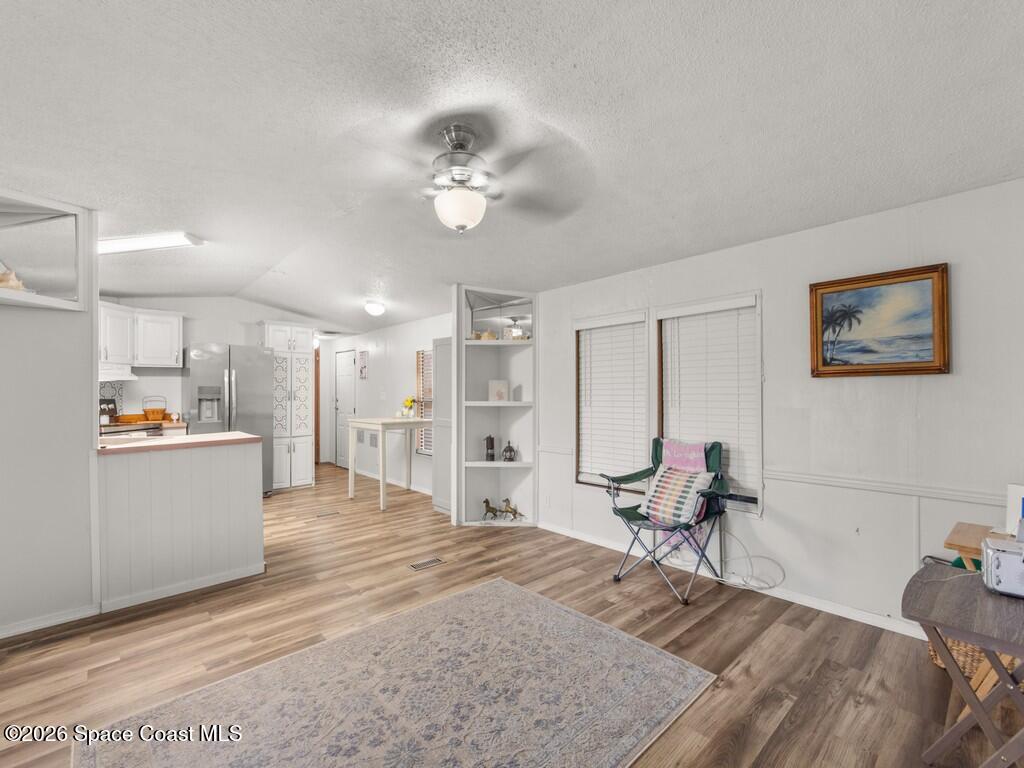 7380 129th Place Sebastian, FL 32958 - Photo 14 of 32 a large bedroom with a bed and glass table