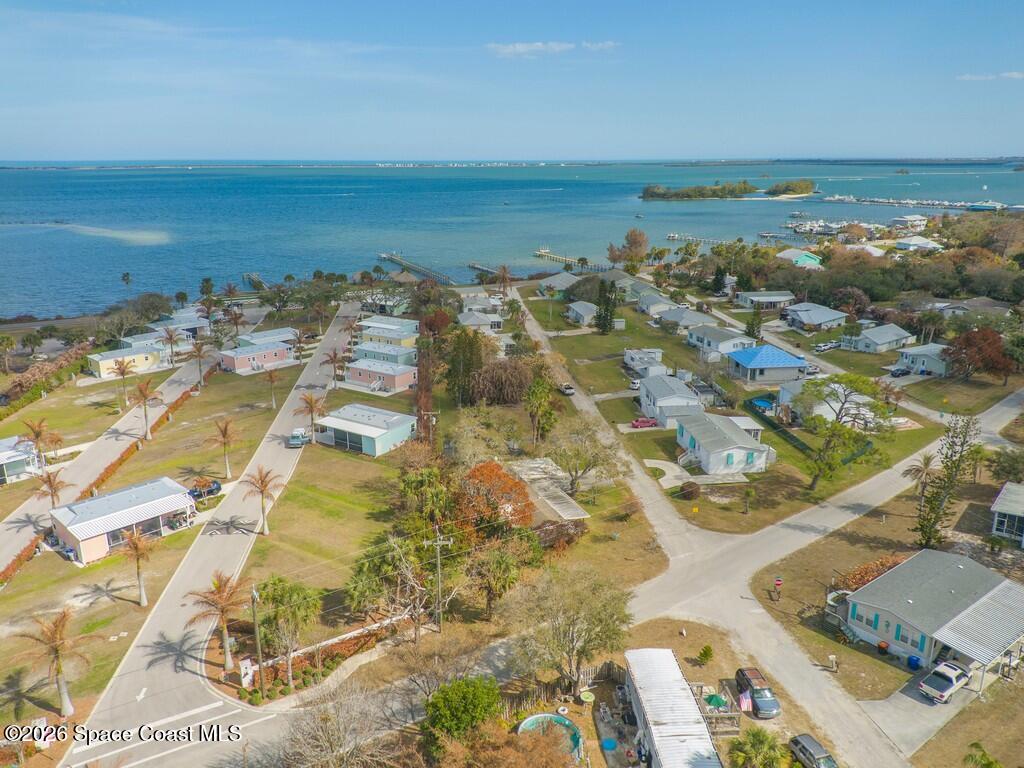 7380 129th Place Sebastian, FL 32958 - Photo 3 of 32 an aerial view of ocean and residential houses with outdoor space