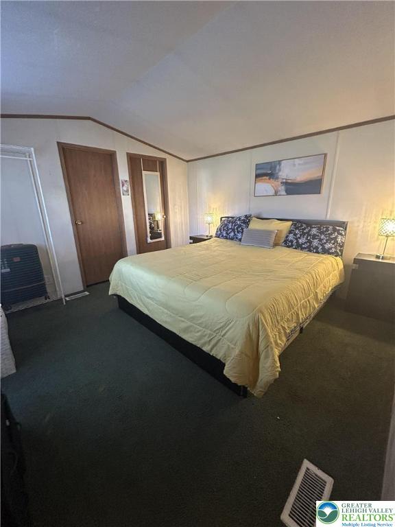 3113 Newburg Road Nazareth, PA 18064 - Photo 10 of 18 a bedroom with a bed and a mirror