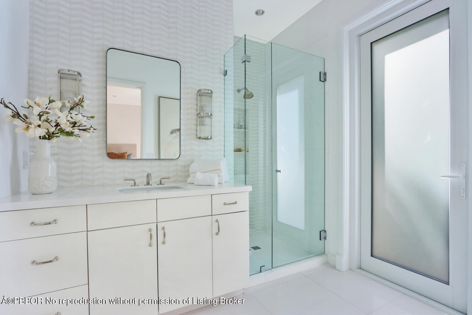 215 Indian Road Palm Beach, FL 33480 - Photo 22 of 31 a bathroom with a shower sink and mirror