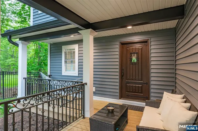 a view of a porch with furniture