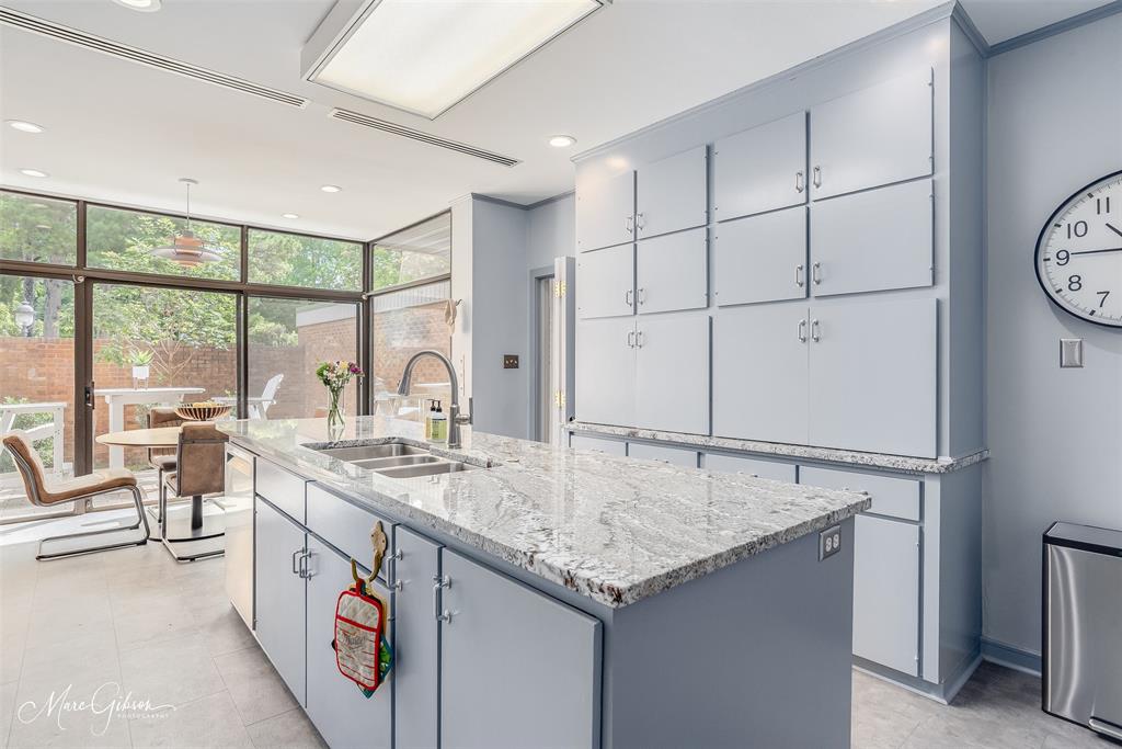 300 Pierremont Road, Unit 18 Shreveport, LA 71106 - Photo 33 of 40 a open kitchen with stainless steel appliances granite countertop a sink and cabinets