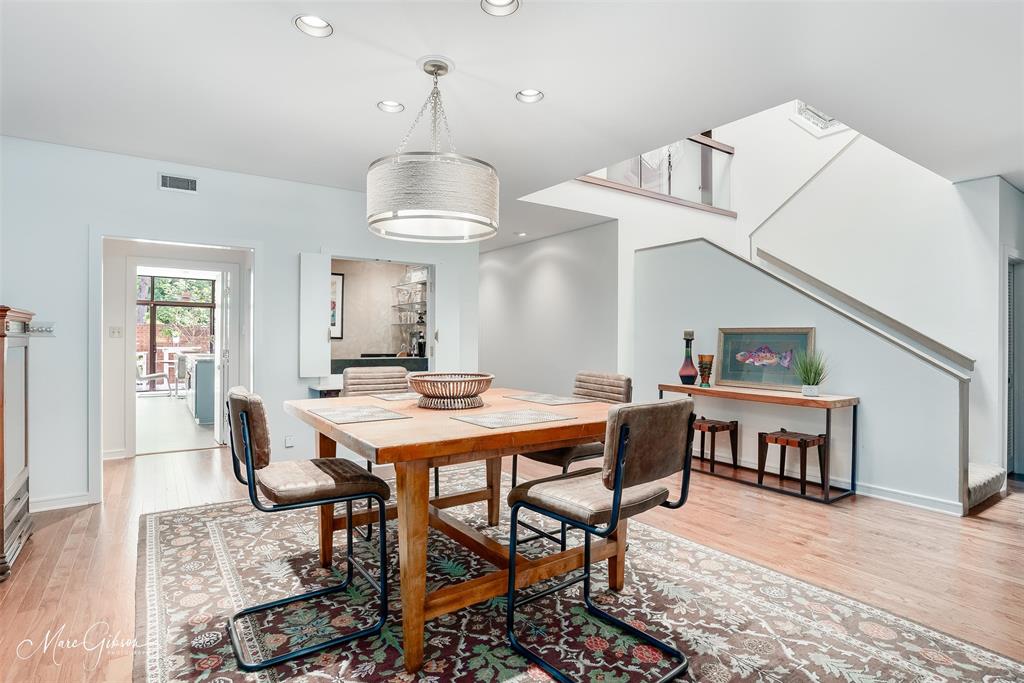 300 Pierremont Road, Unit 18 Shreveport, LA 71106 - Photo 8 of 40 a view of a dining room with furniture window and wooden floor