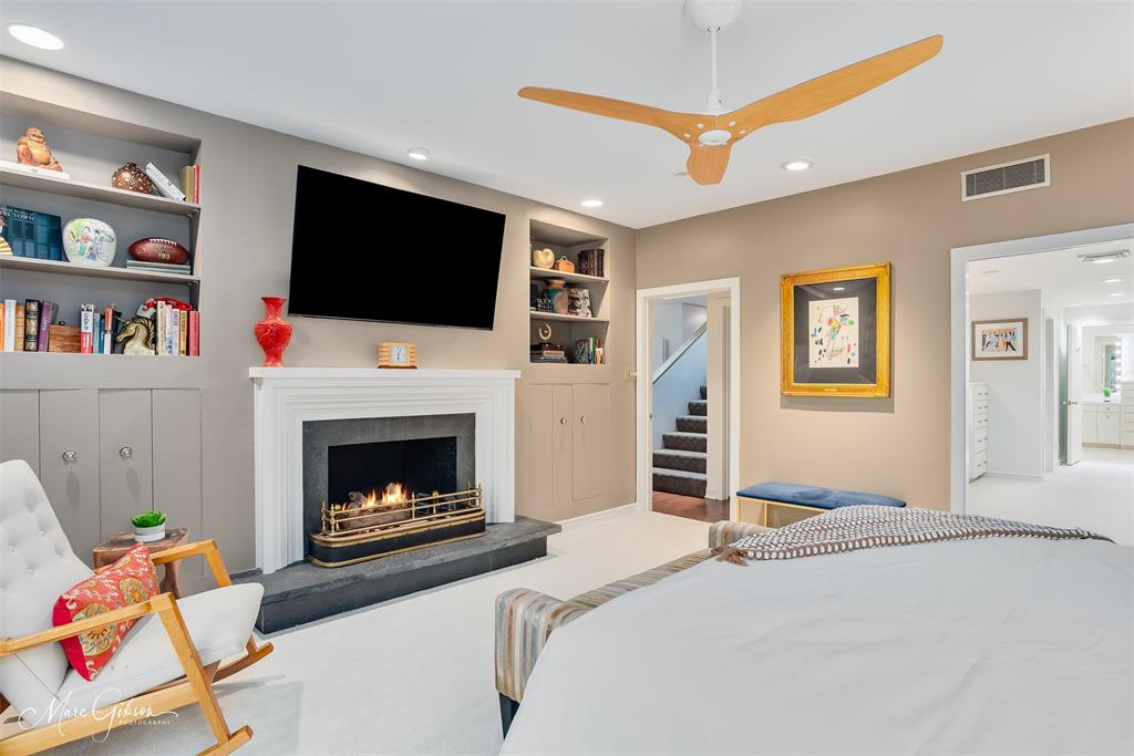 300 Pierremont Road, Unit 18 Shreveport, LA 71106 - Photo 10 of 40 a bedroom with furniture and a fireplace