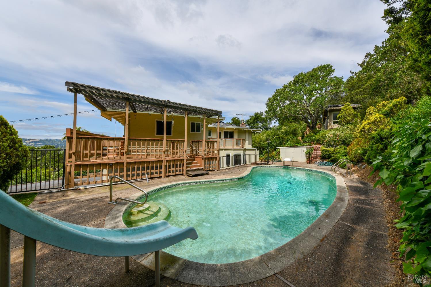 22 Monez Boulevard Napa, CA 94559 - Photo 21 of 30 a swimming pool with outdoor seating yard and barbeque oven