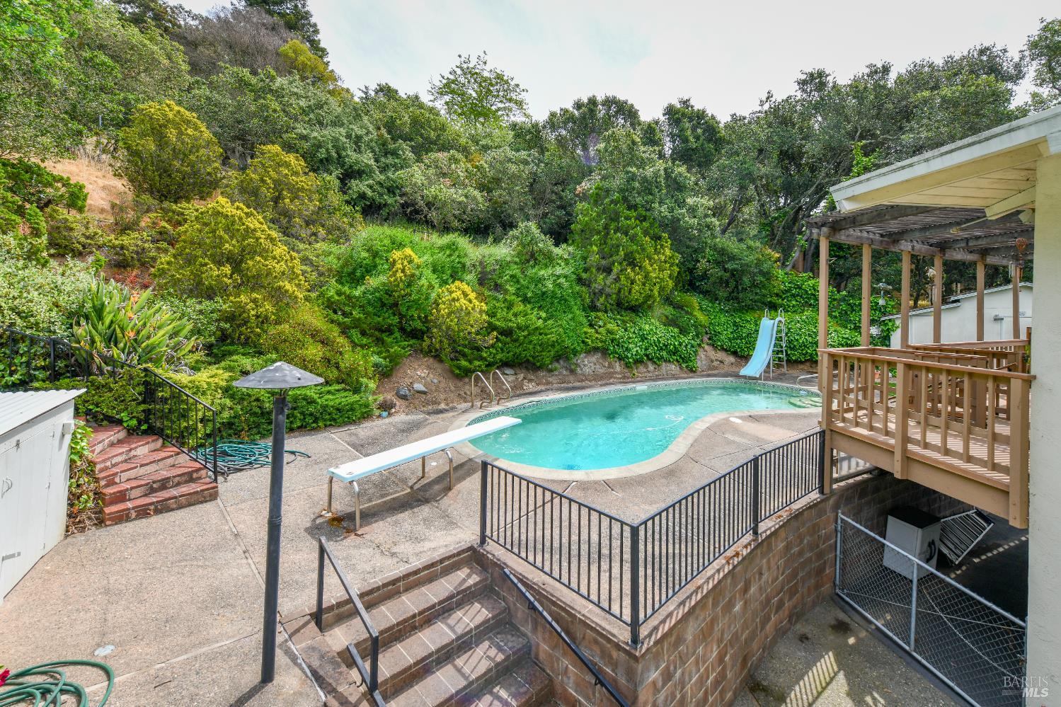 22 Monez Boulevard Napa, CA 94559 - Photo 23 of 30 a view of a roof deck with wooden fence and two chairs