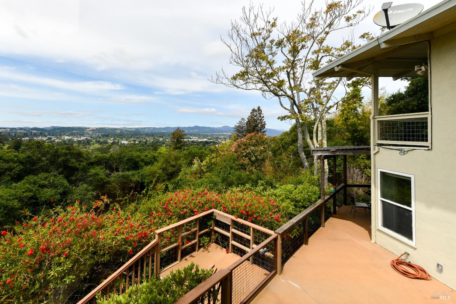 22 Monez Boulevard Napa, CA 94559 - Photo 27 of 30 a view of balcony with wooden floor and fence