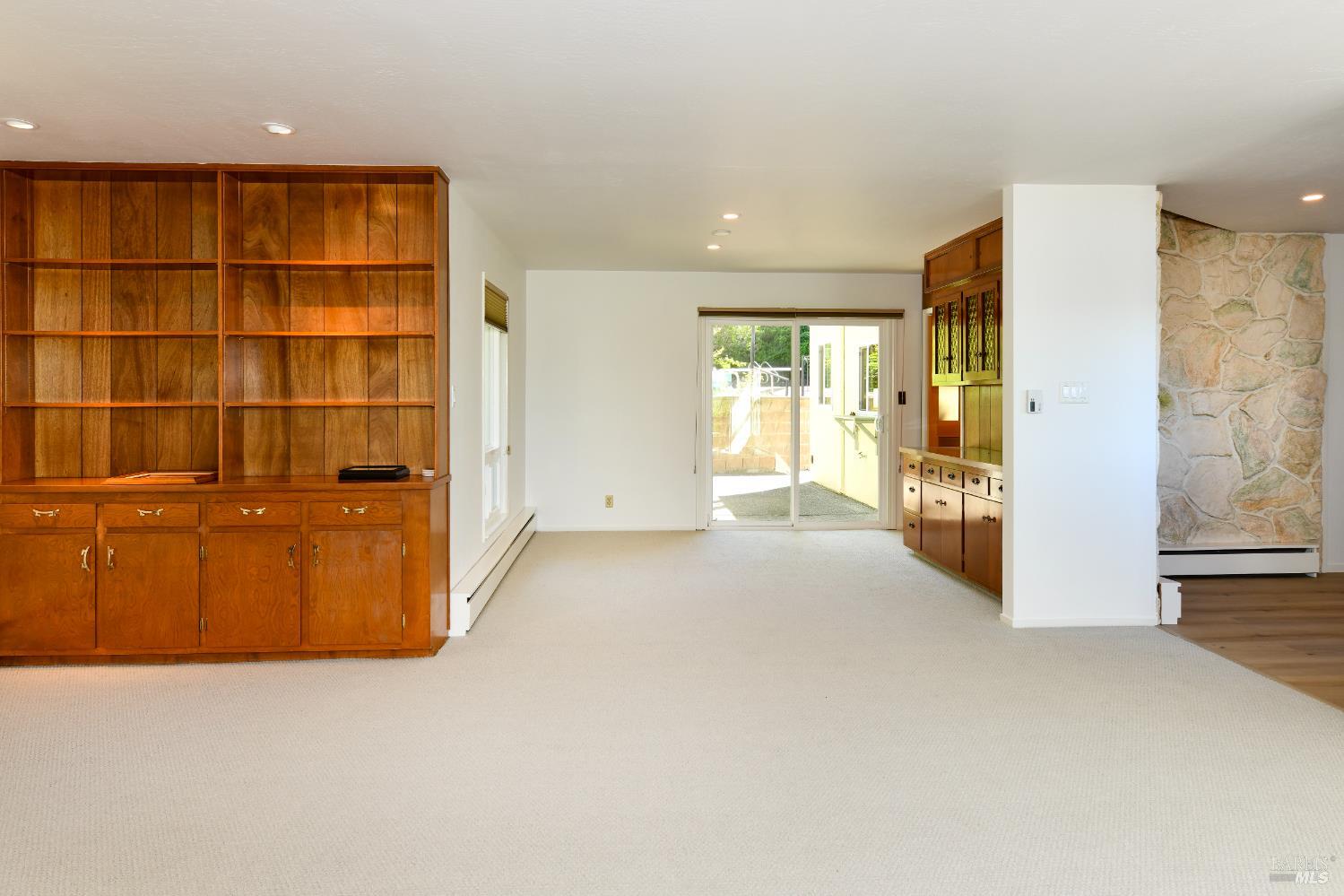 22 Monez Boulevard Napa, CA 94559 - Photo 8 of 30 a view of an empty room with a cabinet and a window