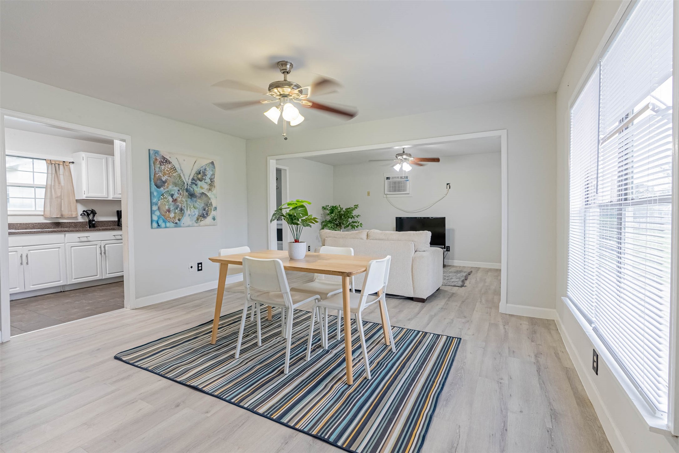 3910 Luca Street Houston, TX 77021 - Photo 1 of 29 a view of a dining room with furniture and wooden floor