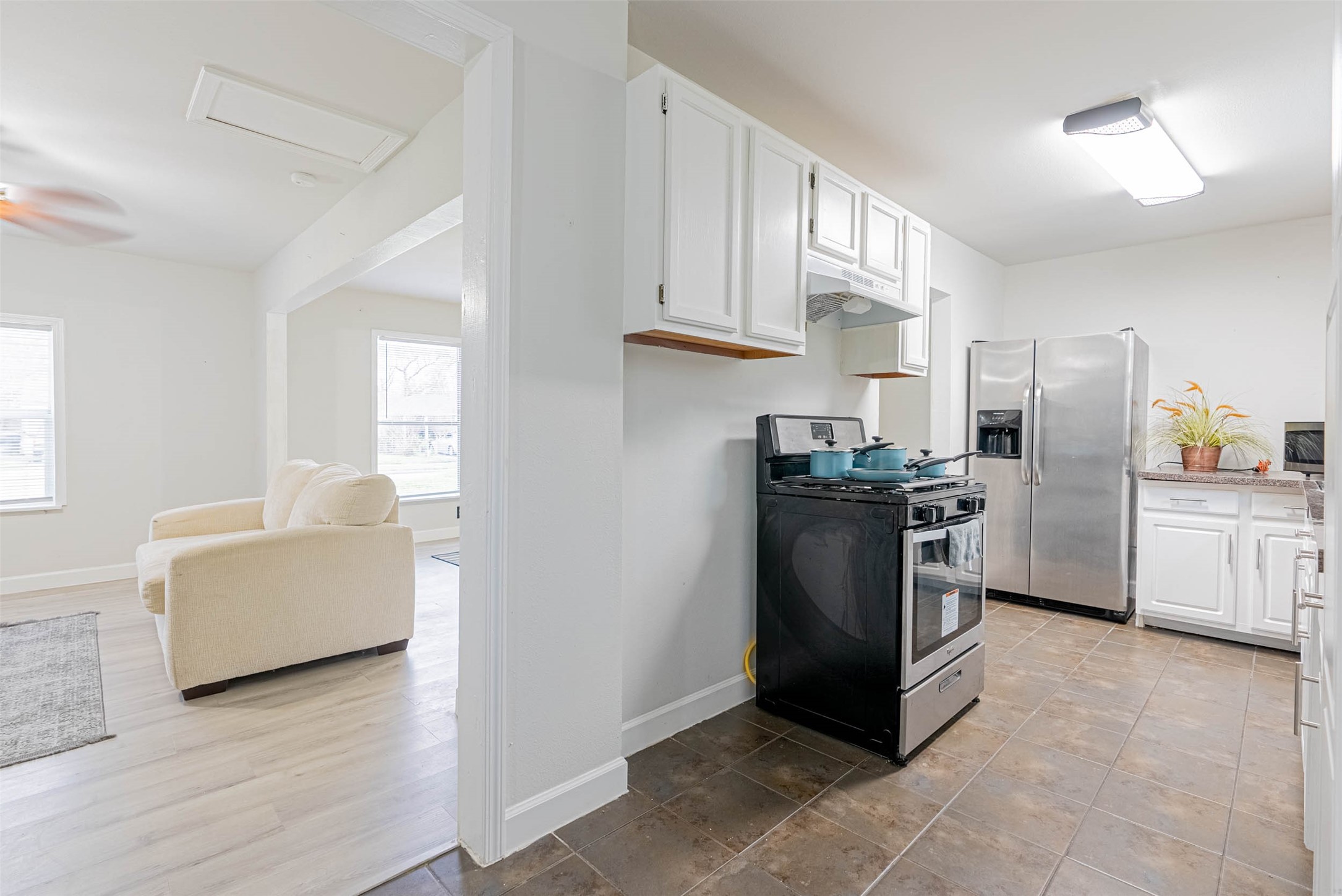 3910 Luca Street Houston, TX 77021 - Photo 11 of 29 a kitchen with stainless steel appliances granite countertop a refrigerator a stove a sink and a refrigerator