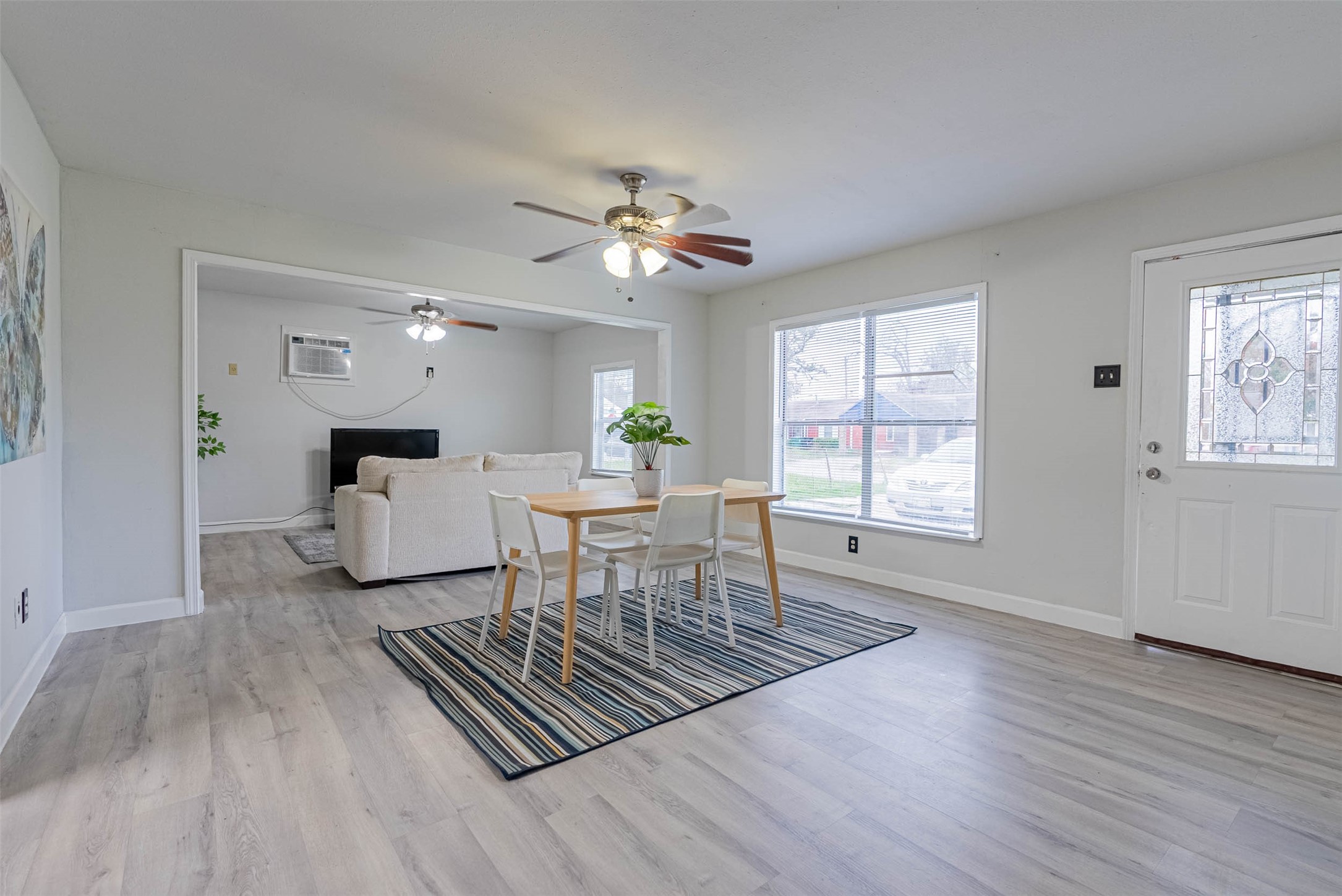 3910 Luca Street Houston, TX 77021 - Photo 2 of 29 a living room with furniture a window and a table