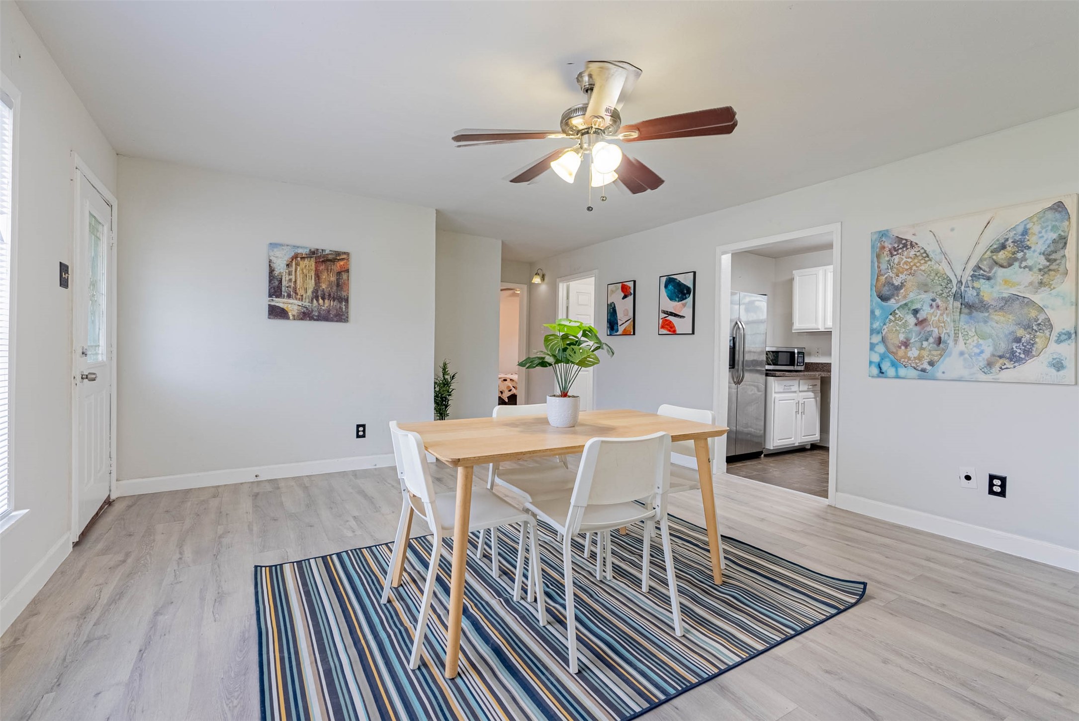 3910 Luca Street Houston, TX 77021 - Photo 4 of 29 a view of a dining room with furniture and wooden floor