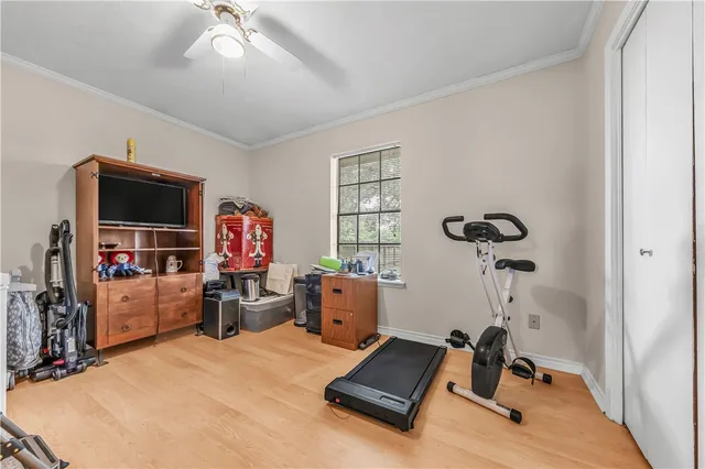 a room with furniture and a flat screen tv