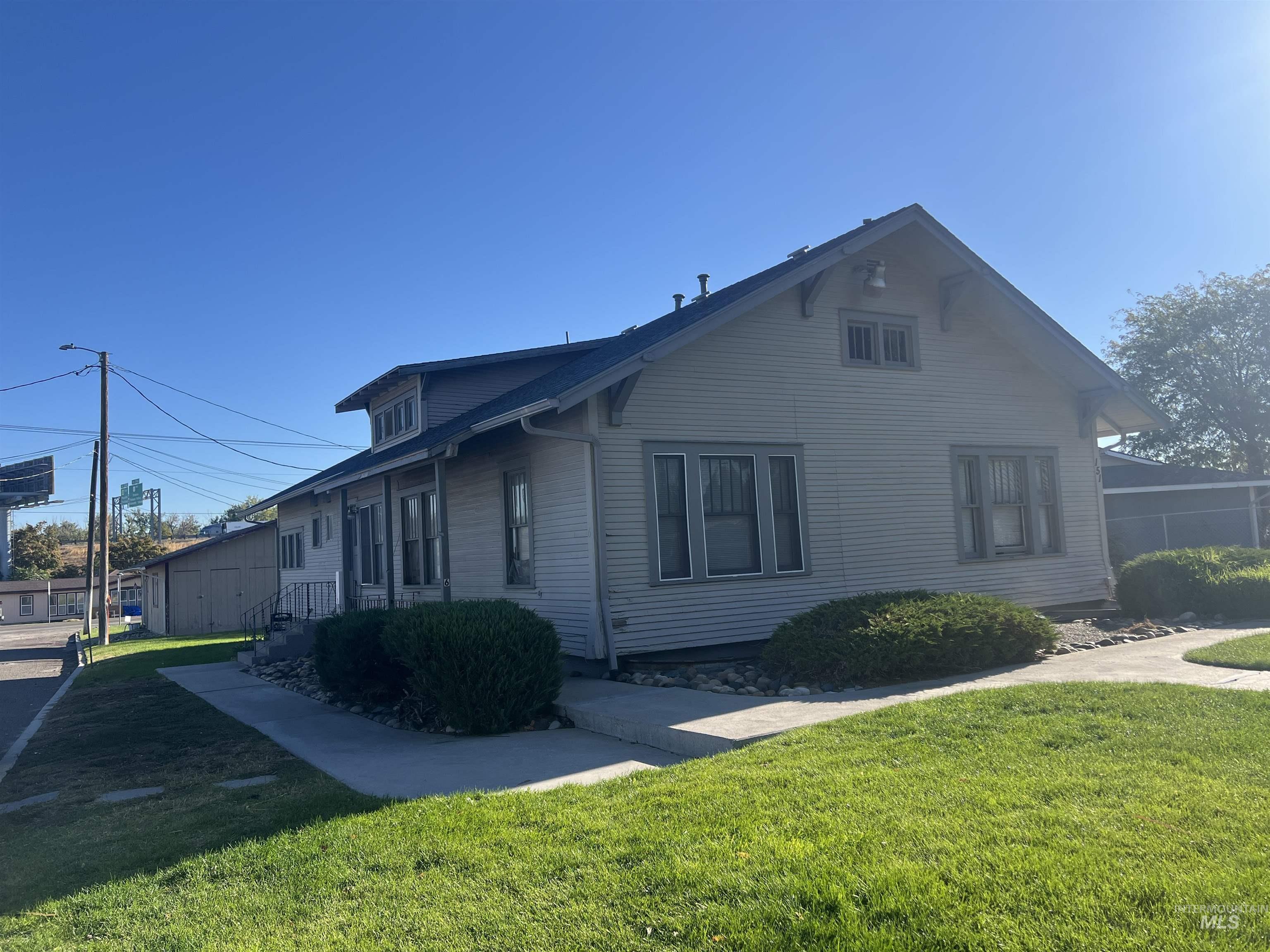 151 Northwest 8th Street Ontario, OR 97914 - Photo 26 of 30 View of side of home with a lawn