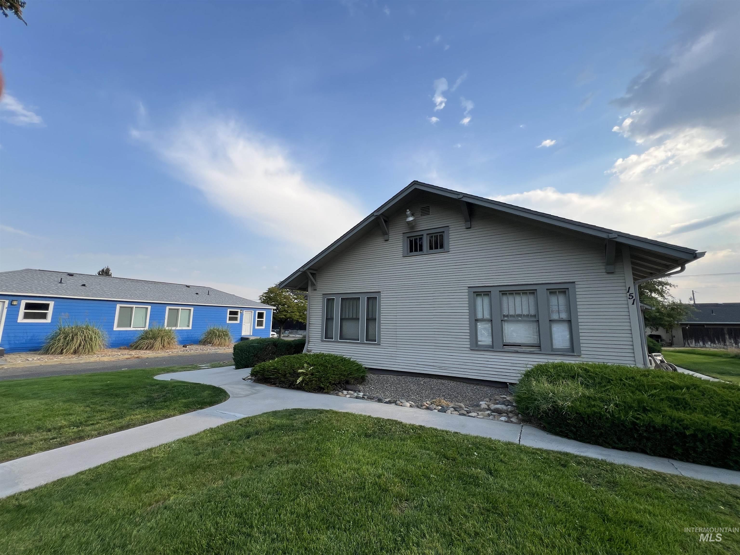 151 Northwest 8th Street Ontario, OR 97914 - Photo 3 of 30 View of side of property featuring a lawn